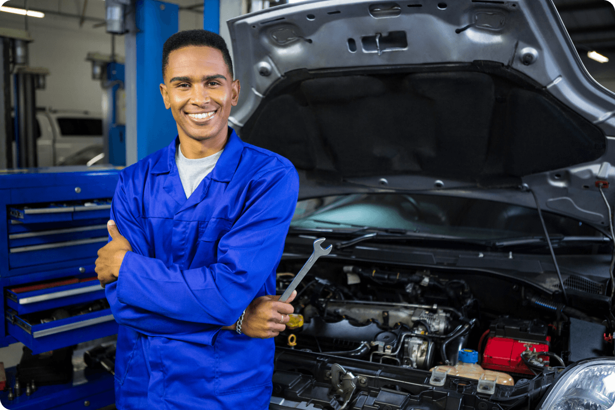 smiling-mechanic-with-arms-crossed-spanner 1 (1)